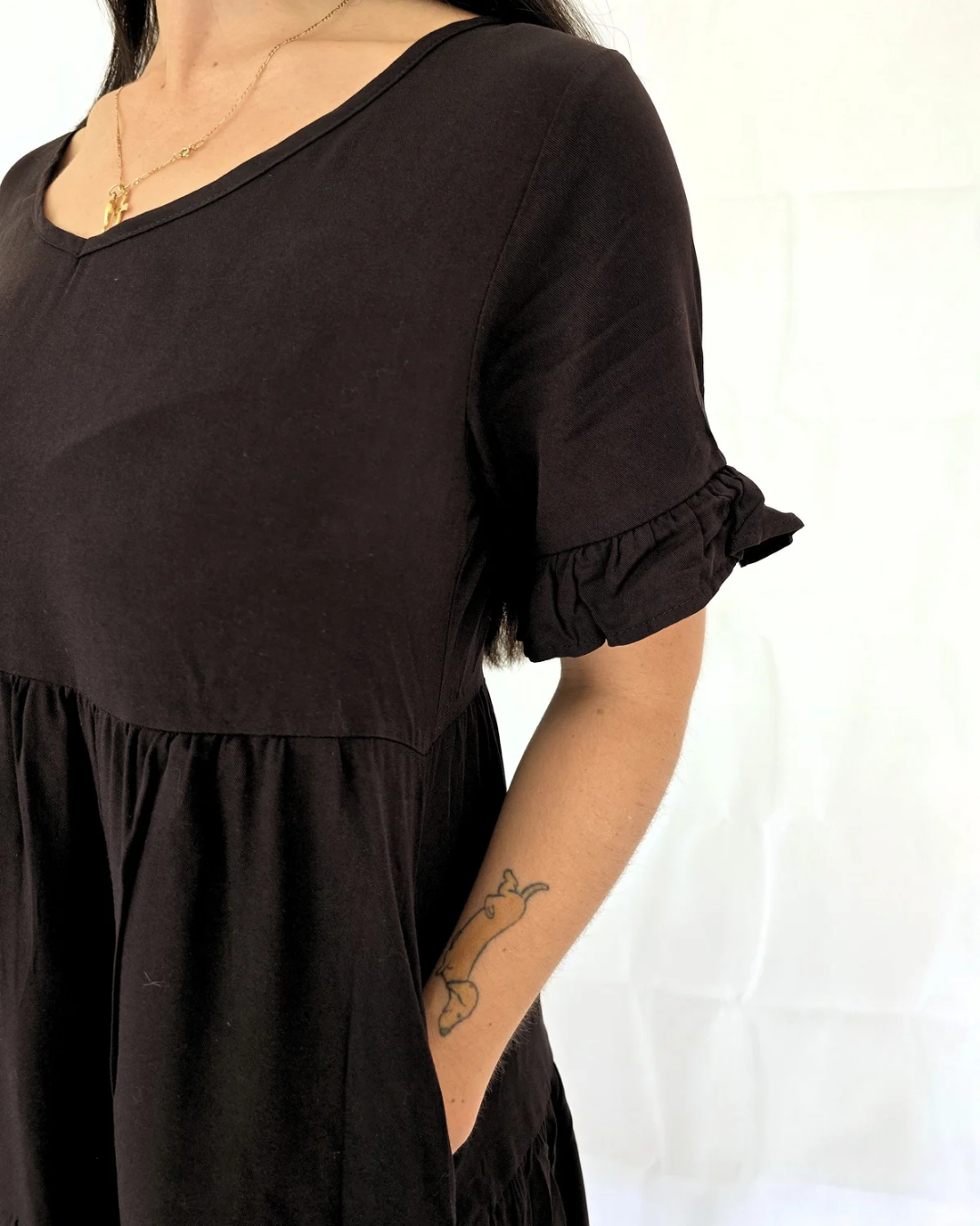 Black casual mini dress with pockets and long sleeve