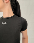 Person wearing a black t-shirt with 'Zejt' logo super stretch