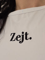White shirt with 'Zejt.' text embroidered logo