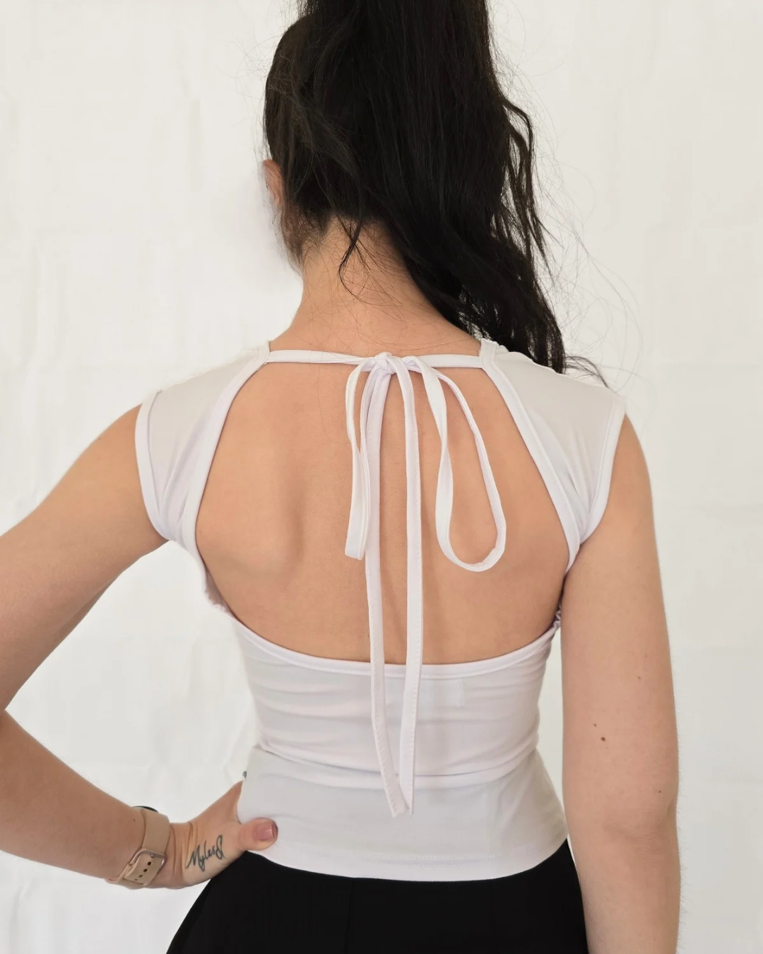 White sleeveless top with open back and ribbon details womens trending viral clothing